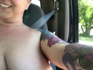 Chastity takes a Sunday drive topless