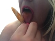 Blonde teasing with boobs and popsicle 11/16