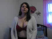 Busty girl smokes and gives a peak 2/16