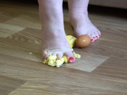 Fat legs bare feet mercilessly trampled banana and raw eggs. Crush Fetish. 7/16