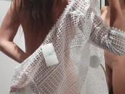 Girl changes clothes in a fitting room 4/16