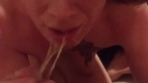 Swallowing his cock while I finger his asshole