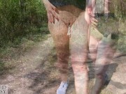 Beautiful woman walking nude with a clit pump outdoors in a public forest 9/16