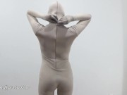 Putting on a leotard over a padlocked zentai 7/16