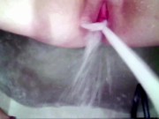 masturbating a narrow pussy with a jet of water to a powerful convulsive orgasm 14/16