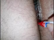 Mistress Super Glues butt plug into slaves ass hole!  9/16