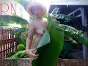 Rural striptease. Country girl dancing in the yard of her house  Rustic striptease with banana leaf 3/16