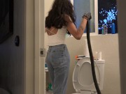 Bombshell Desi Girl Vacuuming the Bathroom in Crop Top and Jeans 13/16