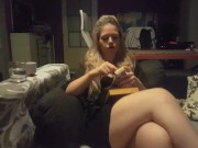 reading a book and smoking cigarette