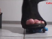 Crushing toy cars with black heels 4/16