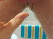 Red head puts tiny cage on cock  12/16