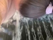 She sucks his cock by a waterfall 16/16