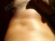 While taking sunbath she is masturbating with her toy - Petite Dream 15/16