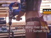 Milf Topless bike ride along river bank (music) 16/16