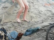 Public peeing teen girl on the beach 1/16