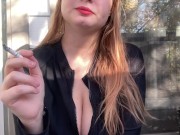 Sexy Smoker Sucks Down A Cigarette 14/16