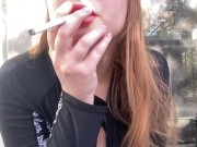 Sexy Smoker Sucks Down A Cigarette 2/16