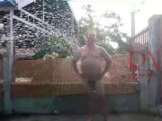 A housekeeper in a collar is tied with a rope to the fence of the yard. 4/16