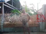A housekeeper in a collar is tied with a rope to the fence of the yard. 7/16