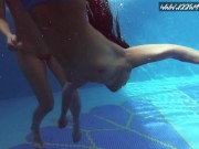 Two hot lesbian brunettes in the swimming pool 14/16