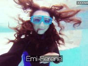 Emi Serene rubs her pussy and films it in the swimming pool
