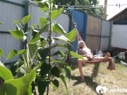 Horny blonde fingering her cunt to orgasm outside