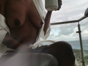 nahomy- Hot Ebony masturbation and orgasm in a public balcony waterfront