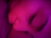 eating babe under the soft pink light