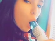 Cute  girl practicing blowjobs