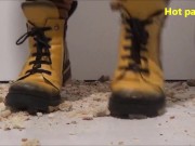 She explodes stewed fruit and several yoghurts in a shower then she crushes cans and dry breads 13/16