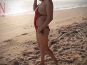 Nice lady at lonely nudist beach. Red swimsuit. Red bikini. 10/16