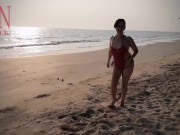 Nice lady at lonely nudist beach. Red swimsuit. Red bikini. 6/16