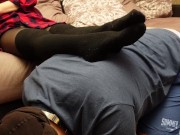 A slave in a collar is kneeling legs in black socks and tights 4/16