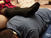 A slave in a collar is kneeling legs in black socks and tights 6/16