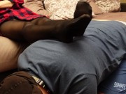 A slave in a collar is kneeling legs in black socks and tights 9/16