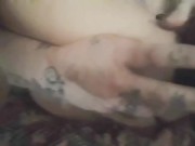 Sexy tattooed milf gets down and dirty with her toys... 2/16