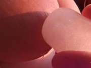Beautiful erotica! Playing with my big titties nipples with an ice cube at sunset. 5/16
