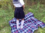 Schoolgirl in uniform shows legs feet foot in white knee socks and pantyhose under skirt 3/16