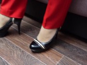 Sexy girl in pants pantyhose shoes shows her legs foot feet fetish 1/16