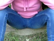Pissing jeans in public street in sunny day 1/16
