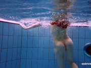 Underwater swimming cutie dressed and then stripped 14/16