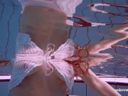 Underwater swimming cutie dressed and then stripped 2/16