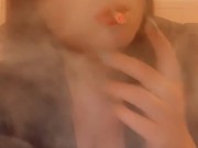 Smoking in a leather dress with red lipstick - full video on my onlyfans- link in bio & in comments 13/16