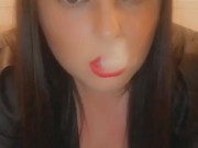 Smoking in a leather dress with red lipstick - full video on my onlyfans- link in bio & in comments 16/16