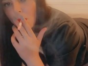 Smoking in a leather dress with red lipstick - full video on my onlyfans- link in bio & in comments 9/16