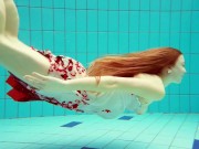 Stripping naked babe Marketa with hairy twat in the pool