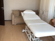 The depilatory master cleans his office in his underwear and waits for the client. 10/16