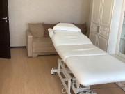 The depilatory master cleans his office in his underwear and waits for the client. 12/16