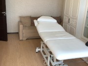 The depilatory master cleans his office in his underwear and waits for the client. 15/16