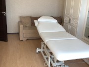 The depilatory master cleans his office in his underwear and waits for the client. 9/16